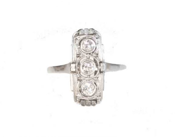 Art Deco diamond panel ring set with three old cut diamonds. Mounted in 14ct white gold