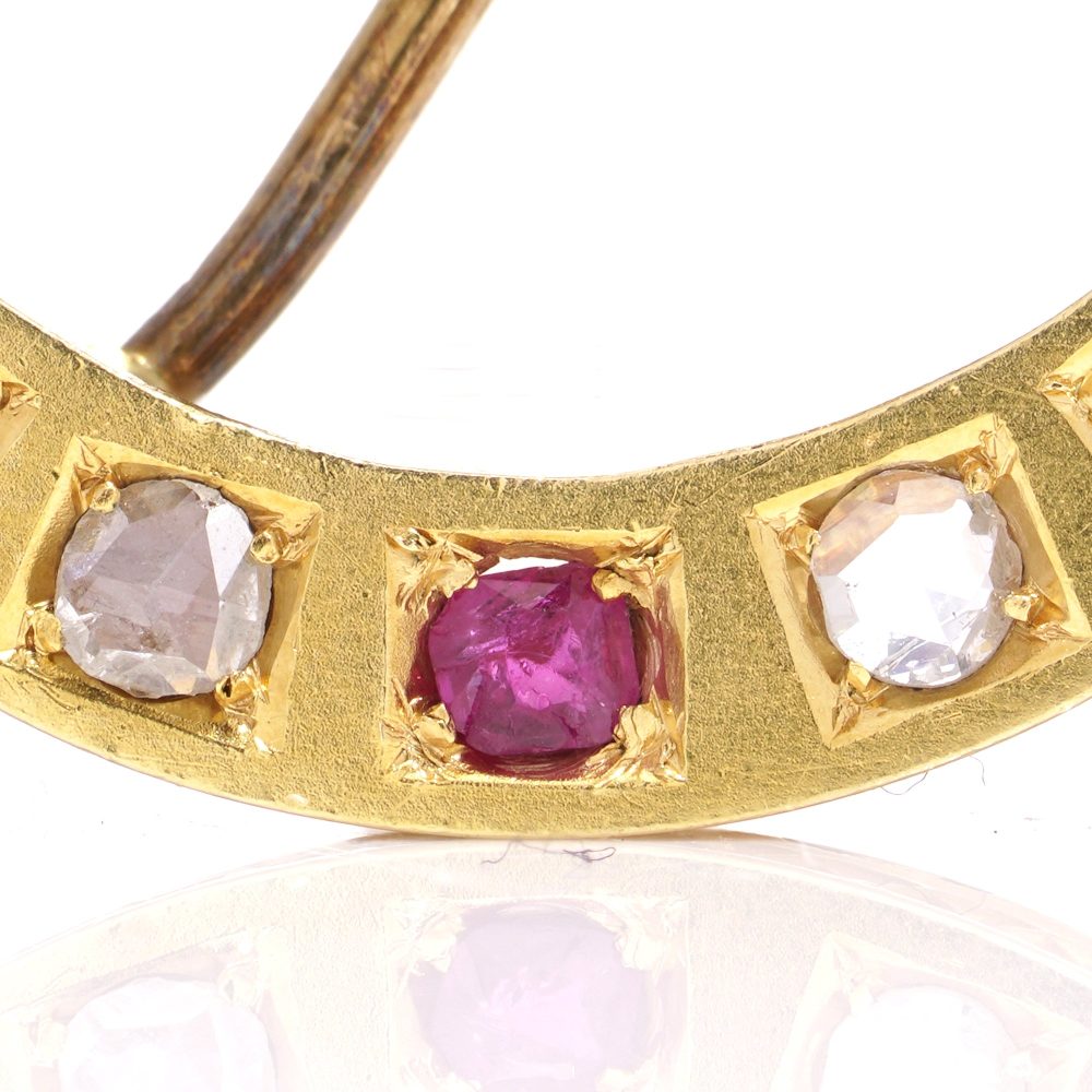 Victorian diamond and ruby crescent brooch in gold.