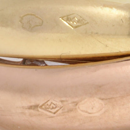 Cartier gold and diamond trinity ring.