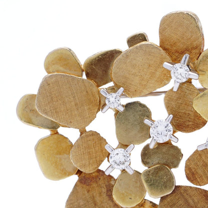 Vintage gold textured petal design diamond brooch.