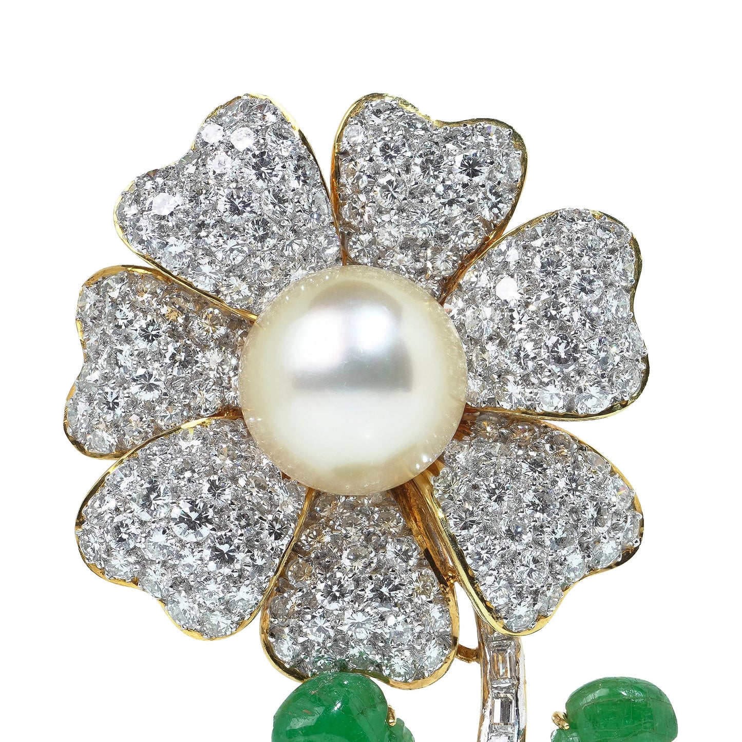A flower brooch set with diamonds, a pearl centre and emerald leaves, in yellow and white gold