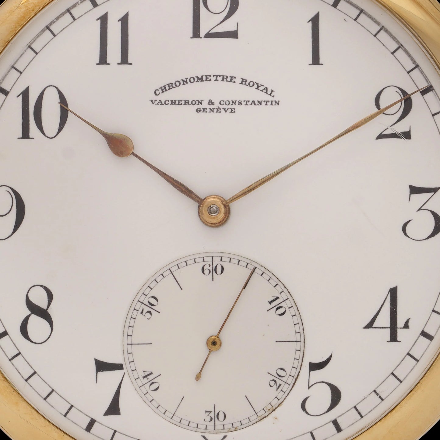 A yellow gold Vacheron & Constantin pocket watch with a white dial and black Arabic numbers