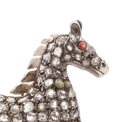 Victorian silver and gold plated horse brooch with diamonds and ruby.