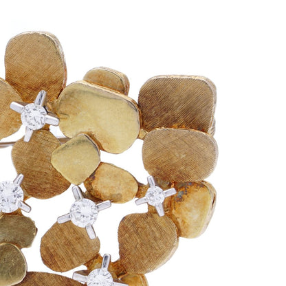 Vintage gold textured petal design diamond brooch.