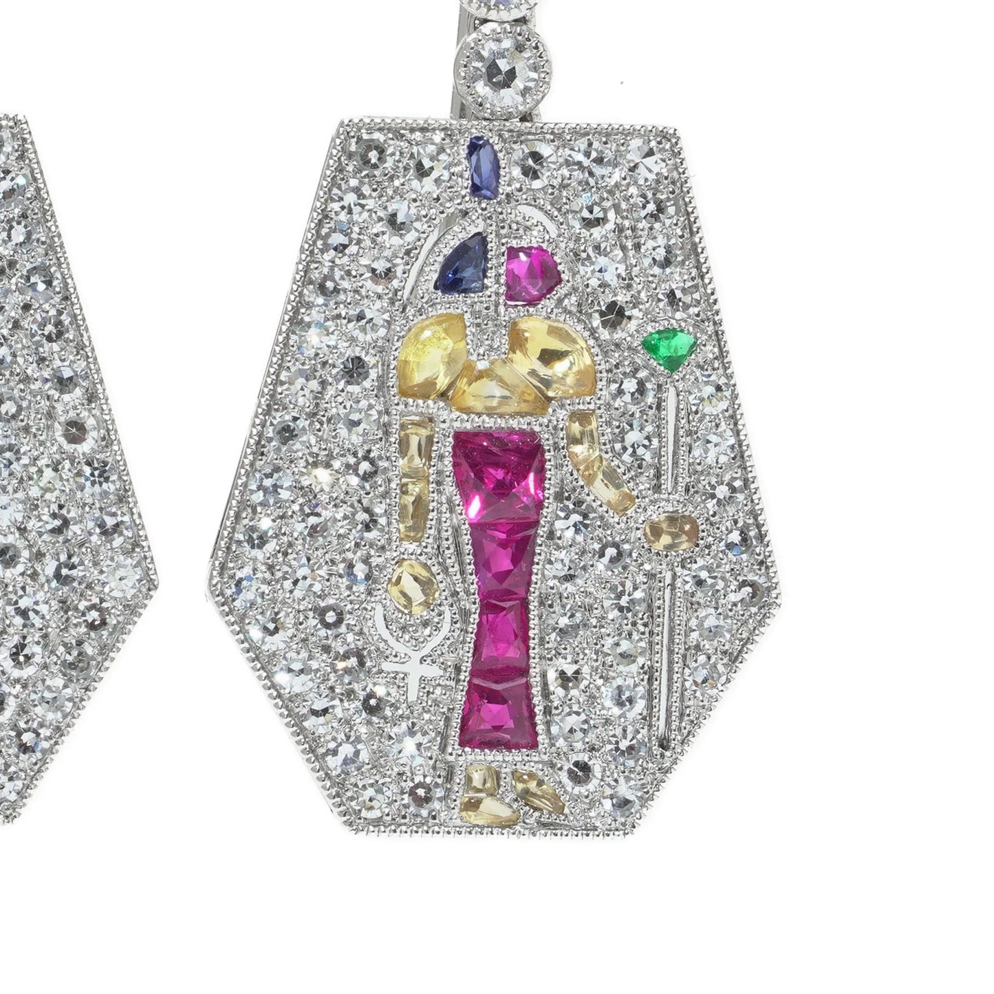 A pair of Eye of Horus drop earrings set with diamonds, rubies, emeralds, blue sapphires and yellow sapphires, in platinum