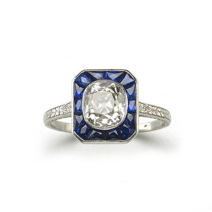 Art deco sapphire and diamond target ring old cut diamond calibre sapphire platinum 1920 1930