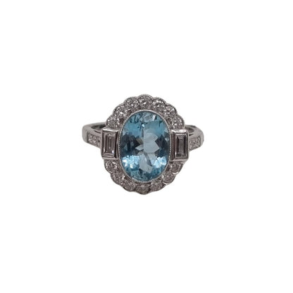 Oval Cut 2.10ct Aquamarine and Diamond Cluster Engagement Ring