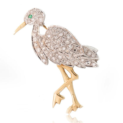 Vintage 18kt yellow gold stork brooch with diamonds