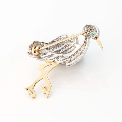 Vintage 18kt yellow gold stork brooch with diamonds