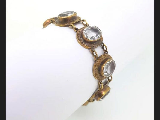 Victorian Quartz Crystal Bracelet; Oval cut quartz crystals set in high relief. Gold not hallmarked, tests as high carat gold. A statement piece