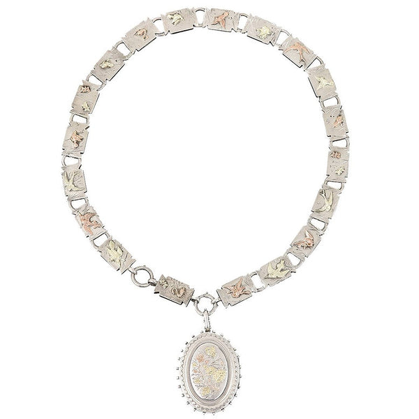 Victorian Antique Silver Link Chain Locket Pendant Necklace, book link chain necklace beautifully adorned with rose and yellow gold meadow birds, animals and insects applied in relief, with accompanying locket with detailed floral motifs and geometric border and beaded edge, Circa 1880