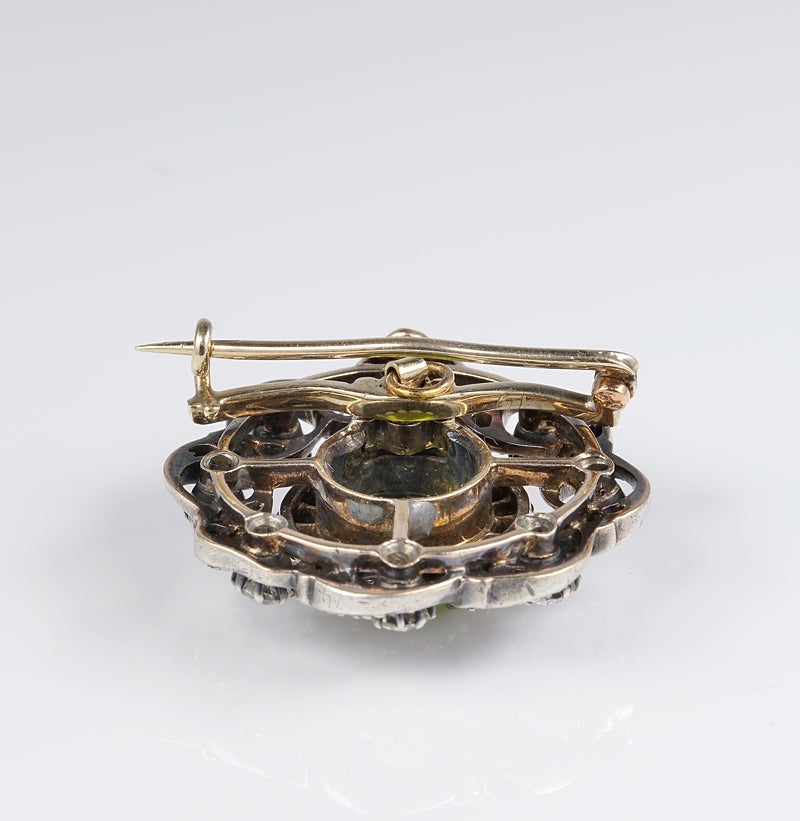Antique Peridot and Diamond Flower Cluster Brooch Pendant in silver upon 18ct yellow gold