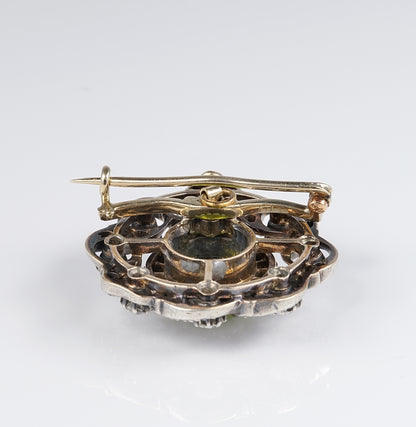 Antique Peridot and Diamond Flower Cluster Brooch Pendant in silver upon 18ct yellow gold