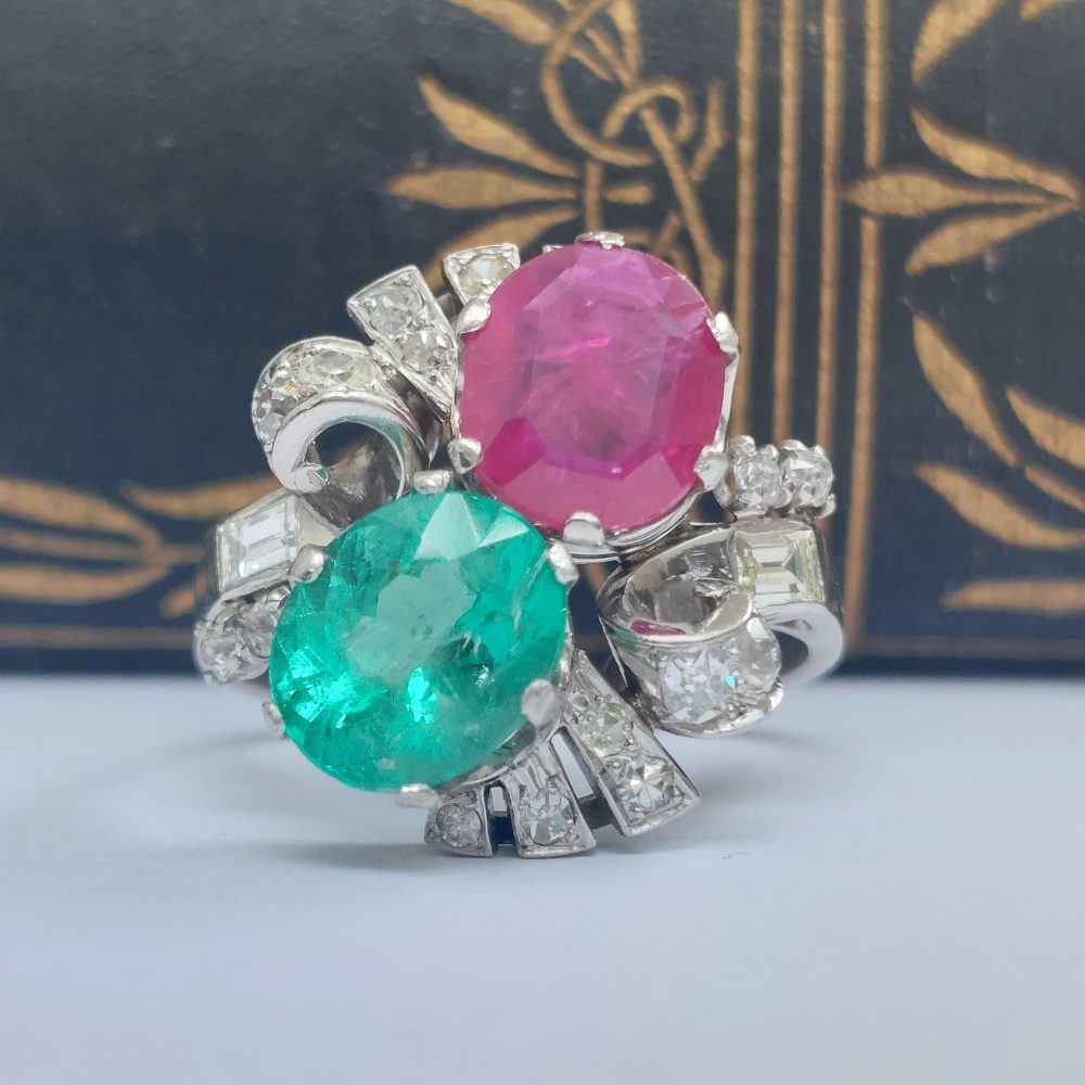 Vintage Emerald and Ruby Crossover Ring with Diamond Set Shoulders