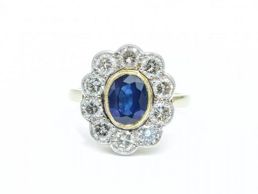 Vintage Oval Cut Sapphire and Diamond Cluster Ring