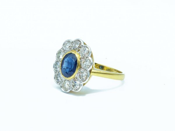 Vintage Oval Cut Sapphire and Diamond Cluster Ring