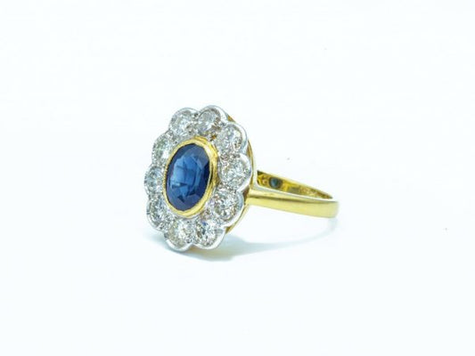 Vintage Oval Cut Sapphire and Diamond Cluster Ring