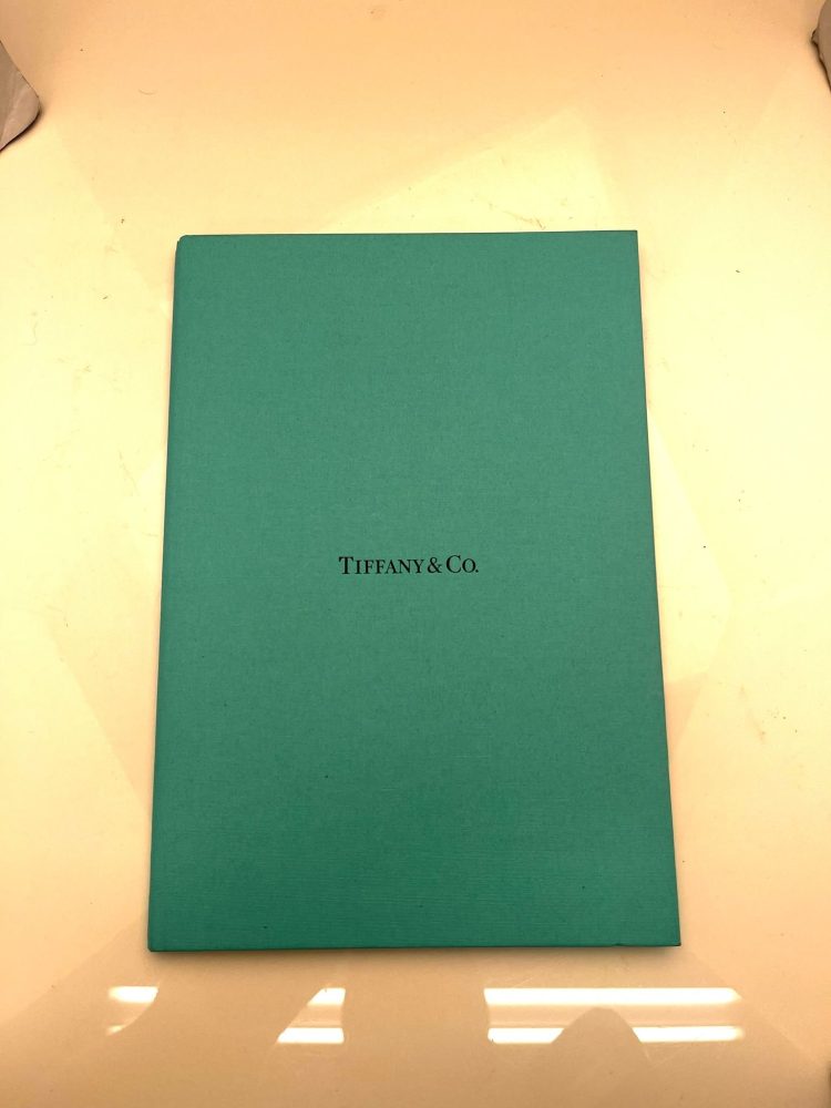 Tiffany & Co platinum diamond halo ring.