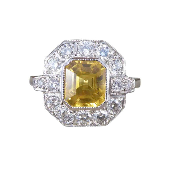 Yellow sapphire and diamond ring
