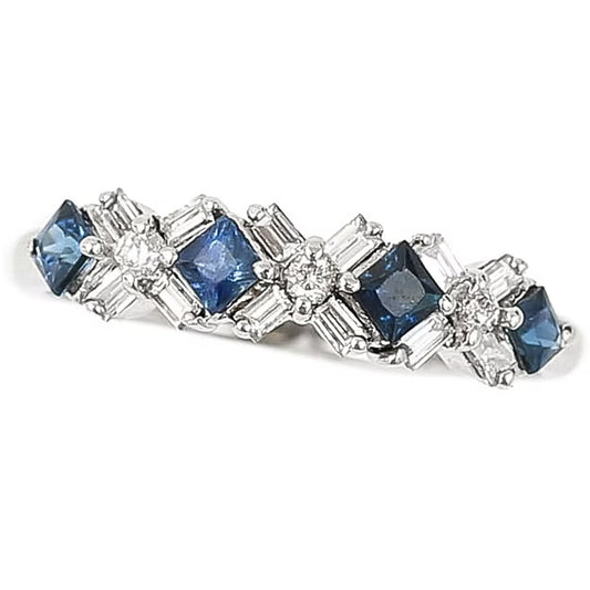 Contemporary 18ct white gold half eternity ring with square-cut blue sapphires and baguette and brilliant-cut diamonds in a geometric design.