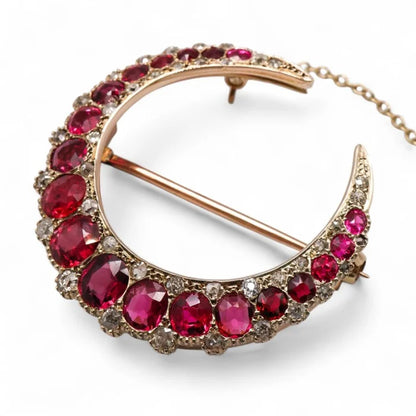 Red spinel crescent brooch 