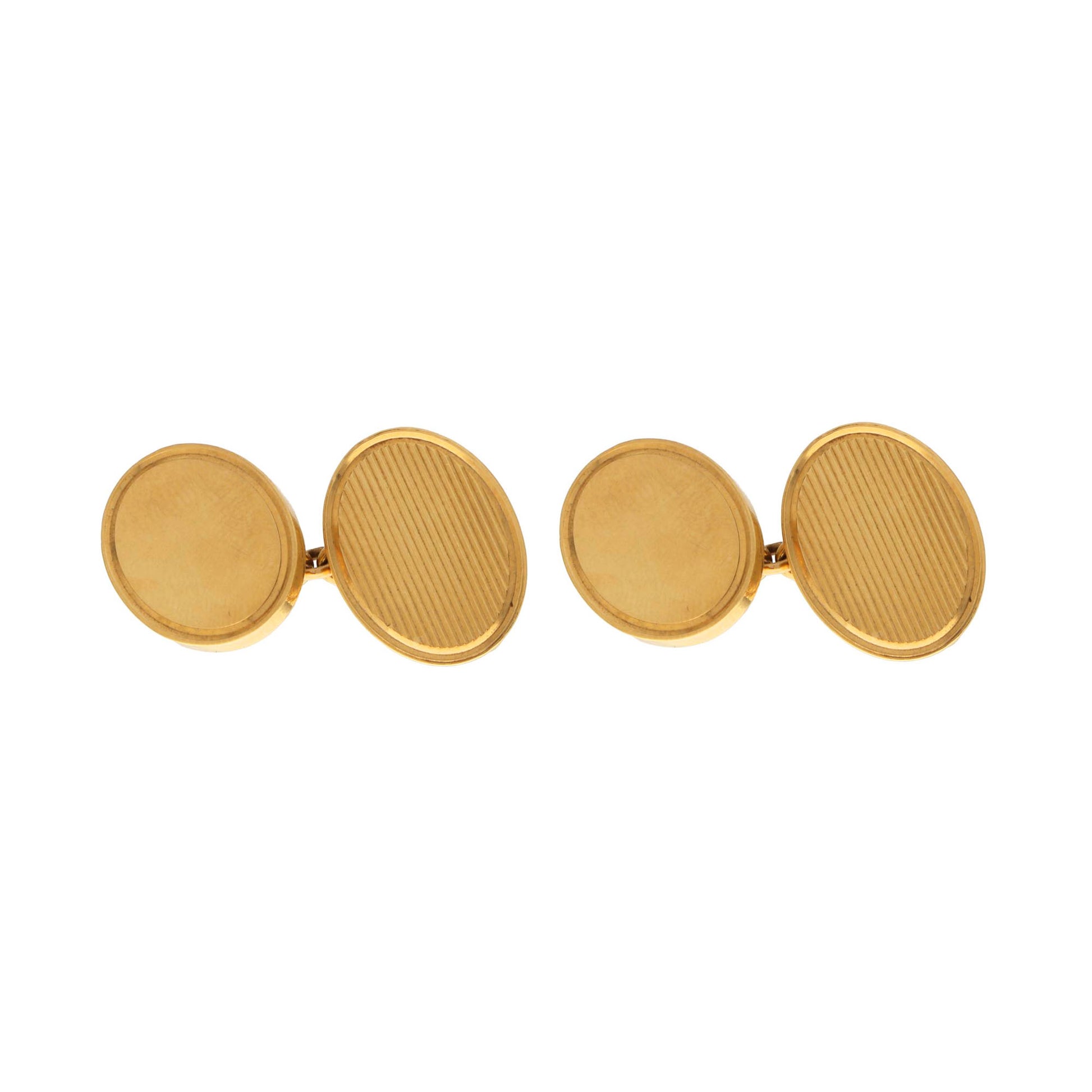 Pair of yellow gold oval cufflinks on a white background
