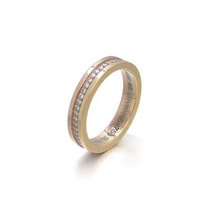 A diamond band in yellow, rose and white gold, stamped Au750