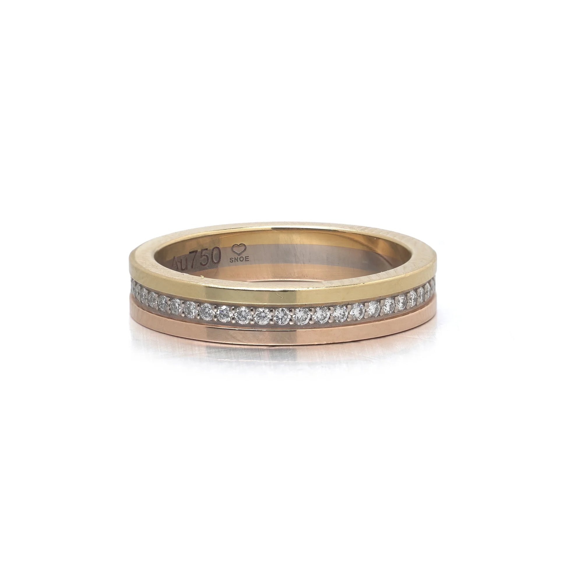 A diamond band in yellow, rose and white gold