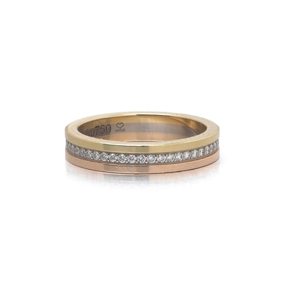 A diamond band in yellow, rose and white gold