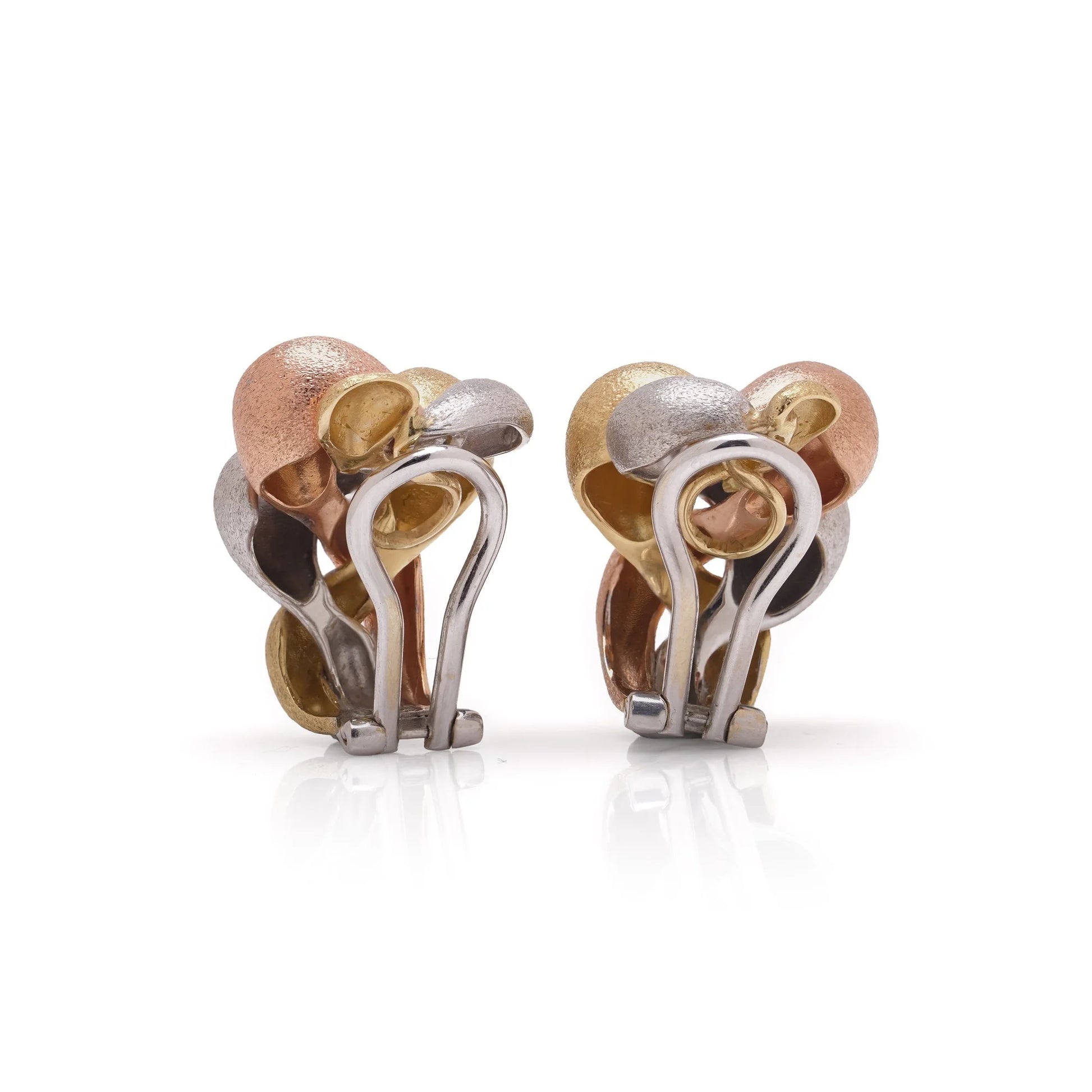 A pair of textured yellow, rose and white gold pebble design earrings, with clip fittings