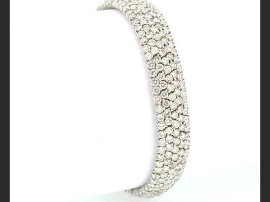 Equistite and luxurious diamond bracelet; Flexible pave setting; estimated 18.00ct total, colour G, clarity VS1; set in 18ct white gold, 22g