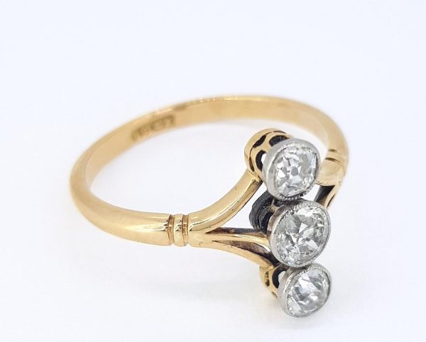 Edwardian diamond three stone ring