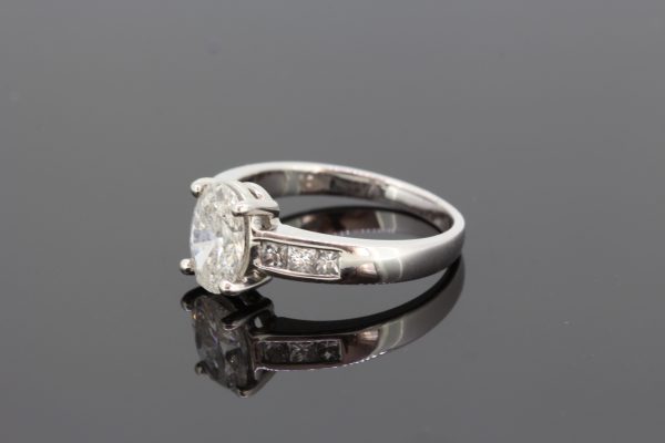 1.22ct Oval Cut Diamond Engagement Ring with Diamond Shoulders in 18ct White Gold