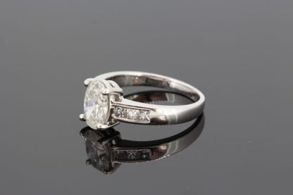 1.22ct Oval Cut Diamond Engagement Ring with Diamond Shoulders in 18ct White Gold