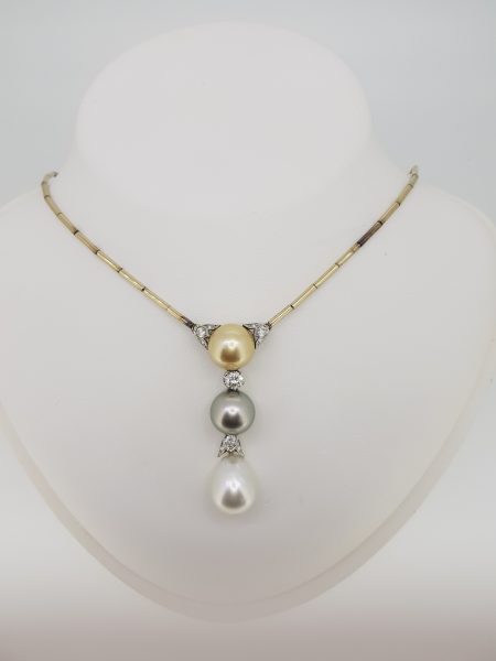 Tri Colour Pearl and Diamond Drop Pendant Necklace; featuring a golden, grey and white pearl suspended in a line accented with 1cts diamonds