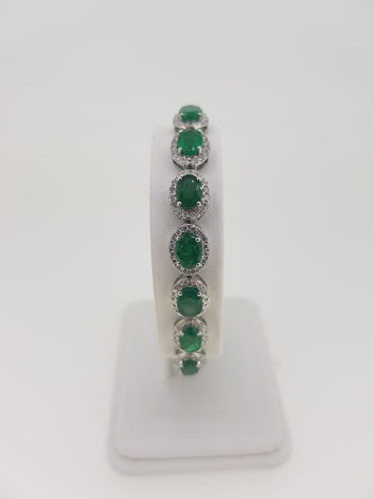 Emerald and Diamond Cluster Bracelet in 18ct white gold. Emeralds 13.00 carats. Diamonds 3.20 carats