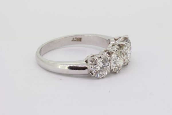 Four Stone Diamond Ring; featuring four round brilliant-cut diamonds, 2.10 carat total, claw set and mounted in 18ct white gold
