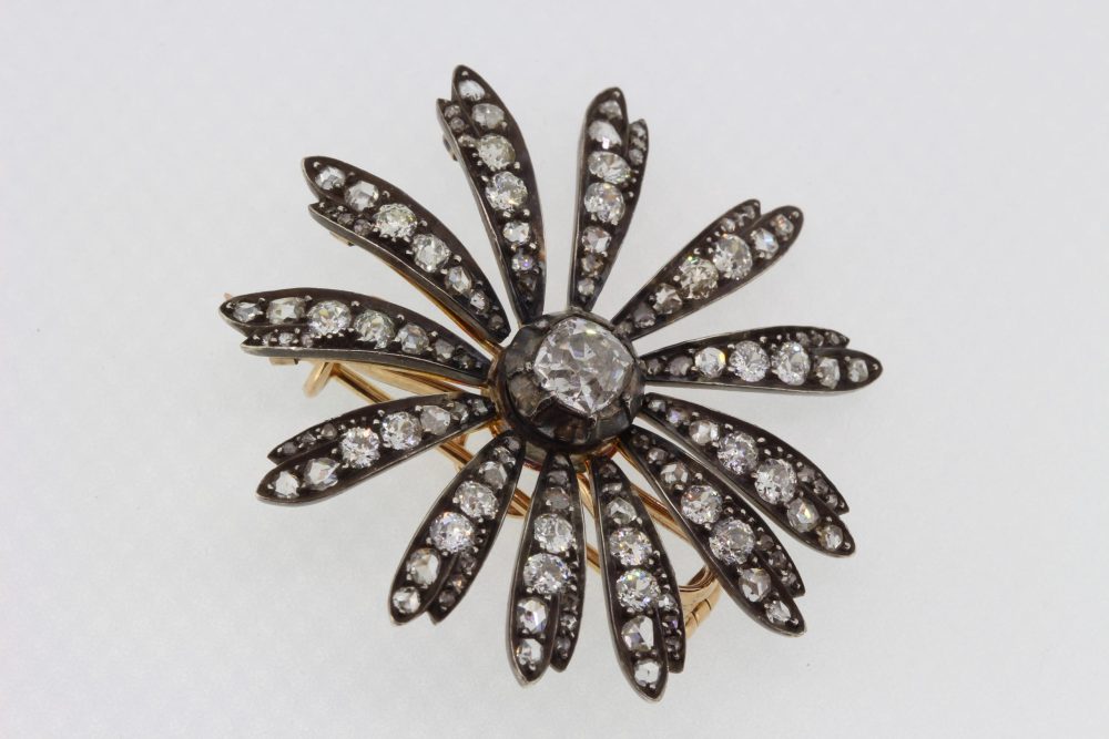 Antique Victorian Old Cut Diamond Daisy Flower Brooch Pendant, 1.30 carat central old-cut diamond with diamond set petals, in silver and gold