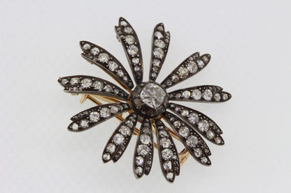 Antique Victorian Old Cut Diamond Daisy Flower Brooch Pendant, 1.30 carat central old-cut diamond with diamond set petals, in silver and gold
