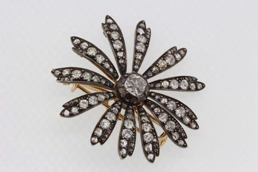 Antique Victorian Old Cut Diamond Daisy Flower Brooch Pendant, 1.30 carat central old-cut diamond with diamond set petals, in silver and gold