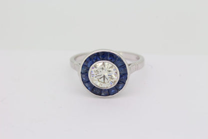 1.21ct Diamond and Calibre Sapphire Target Cluster Engagement Ring