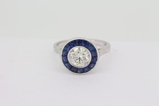 1.21ct Diamond and Calibre Sapphire Target Cluster Engagement Ring