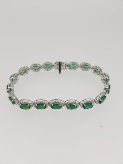 Emerald and Diamond Cluster Bracelet in 18ct white gold. Emeralds 13.00 carats. Diamonds 3.20 carats