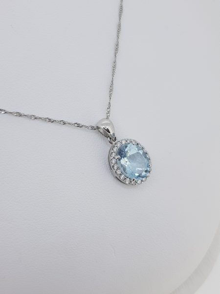 1.53ct Oval Cut Aquamarine and Diamond Cluster Pendant