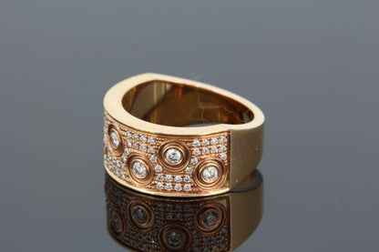 Contemporary Diamond Dress Ring in 18ct Rose Gold; seven brilliant cut diamonds in an asymmetric pattern upon a pave set diamond background, 0.59 carat total