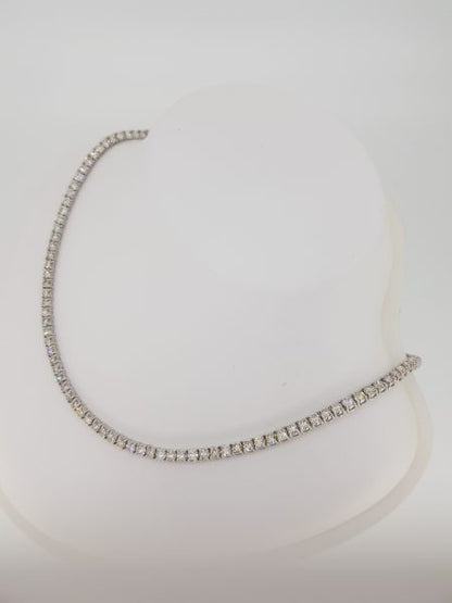 Fine Diamond Line Necklace; 17.90 carats of round brilliant cut diamonds, each four-claw set and mounted in 18ct white gold, 33cm in length