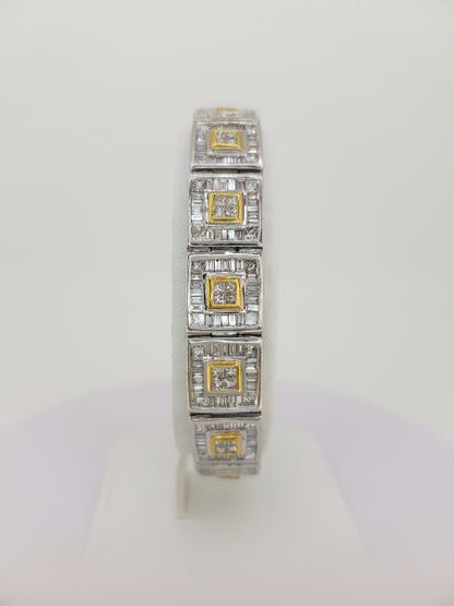 12.80ct Baguette Cut Diamond Link Bracelet; each square link comprises of a central brilliant-cut diamond cluster within a yellow gold setting, all within a baguette-cut diamond surround, in 18ct white gold, 12.80 carat total