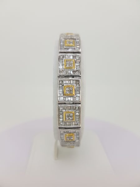 12.80ct Baguette Cut Diamond Link Bracelet; each square link comprises of a central brilliant-cut diamond cluster within a yellow gold setting, all within a baguette-cut diamond surround, in 18ct white gold, 12.80 carat total
