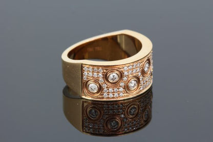 Contemporary Diamond Dress Ring in 18ct Rose Gold; seven brilliant cut diamonds in an asymmetric pattern upon a pave set diamond background, 0.59 carat total