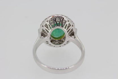 Contemporary 2.20ct Emerald and Diamond Oval Cluster Ring in 18ct White Gold
